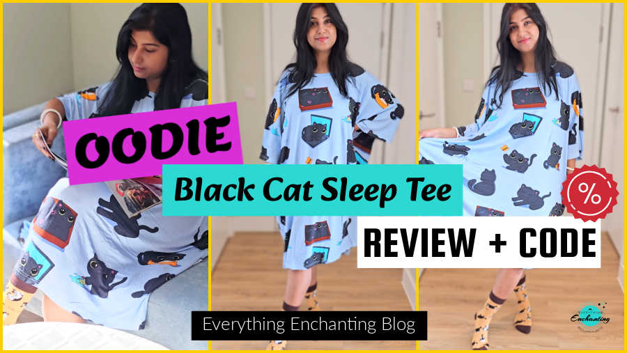 UK fashion blogger Anamika Chattopadhyaya reviews an oversized light-blue Oodie Black Cat Sleep Tee. The tee features an all-over print of playful black cats engaging in various activities like sitting on laptops and playing. The woman is wearing Bare Kind UK cat patterned socks and is shown in three different poses against a light background, highlighting the tee's roomy fit. Text overlay reads "OODIE Black Cat Sleep Tee REVIEW + CODE" with "Everything Enchanting Blog" at the bottom.