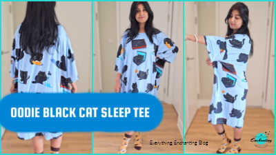A multi-panel image showcasing uk fashion blogger Anamika chattopadhyaya modeling the Oodie Black Cat Sleep Tee. The center panel shows the full front view, highlighting the oversized fit and the playful black cat print on a light blue background. The left panel shows a back view of the sleep tee, emphasizing the generous drape. The right panel shows the woman with her arm extended, demonstrating the roominess of the sleeve and the four-way stretch of the fabric. A large blue text bubble overlay reads "OODIE BLACK CAT SLEEP TEE".