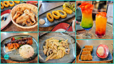 A multi-image collage of Mediterranean dishes and drinks served on a marble-patterned tabletop. The selection includes a basket of charred artisanal flatbread and a plate of golden-brown fried calamari rings served with a side salad and lemon wedge. Two vibrant, multi-layered fruit juices—one with a blue, green, and orange gradient and another with a red and orange ombré—are topped with fresh orange rose petals. Main courses feature a mixed grill with chicken and lamb skewers over flatbread with a side of white rice, and a bowl of creamy pesto chicken penne pasta with mushrooms. Dessert consists of four crispy, honey-glazed baklava rolls served with a scoop of vanilla ice cream in a red ceramic dish.