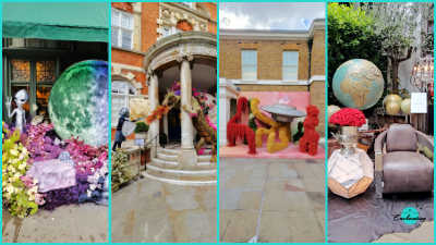 A horizontal collage of four separate vertical photographs displaying different outdoor floral installations.

First panel (far left): A display outside a shopfront featuring a silver alien figure standing amidst a dense bed of purple and pink flowers, positioned next to a large, spherical replica of a colorful planet or moon.

Second panel (middle left): An installation at the entrance of a brick building with a stone portico, showing a figure in armor holding a shield facing off against a large floral dragon sculpture that appears to breathe orange flowers.

Third panel (middle right): A display against a pink backdrop featuring a silver UFO saucer propped up by abstract, fuzzy structures in red and yellow on a stone courtyard.

Fourth panel (far right): A stylized seating area outdoors featuring a brown armchair, a metallic geometric side table holding a large arrangement of red roses, and a golden globe prop in the background surrounded by lush greenery.